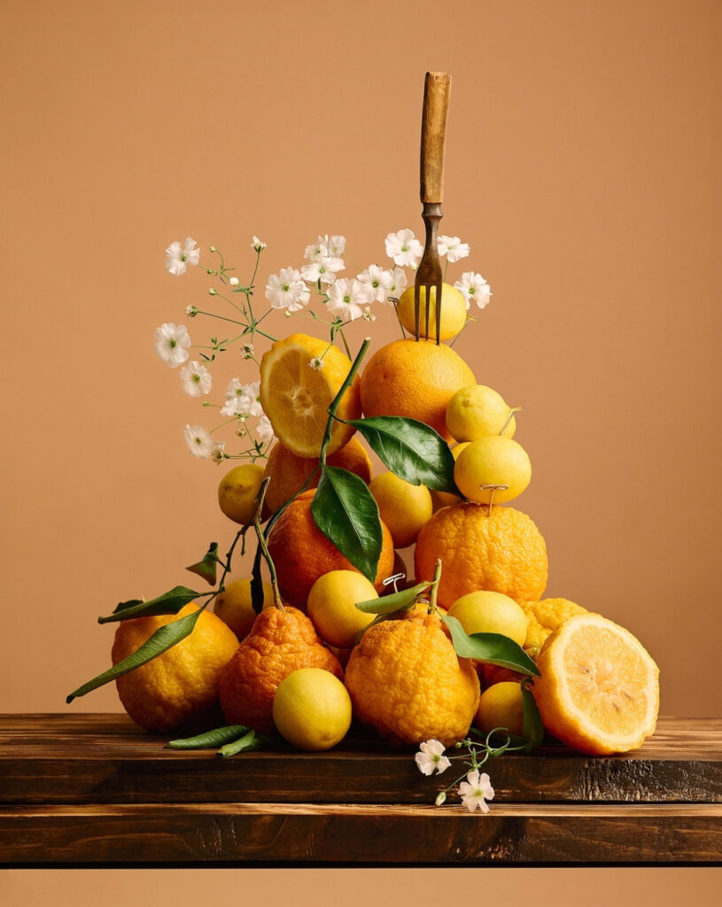 A stack of California citrus is artfully placed in a still life image by photographer Rebecca Peloquin.